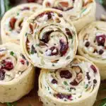 Rollitos de crema de queso de arandano y nuez pecana Receta de aperitivofile