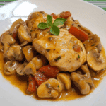 Pollo en salsa con champiñones