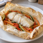 Merluza con verduras en papillote